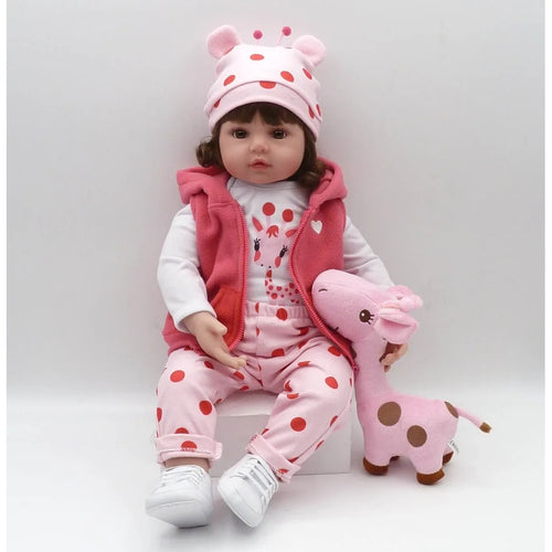 Josie, 19 inch reborn baby doll with her giraffe